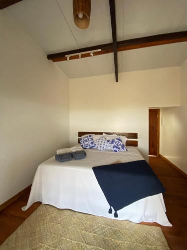 Postel nebo postele na pokoji v ubytování Aponem Spa & Pousada