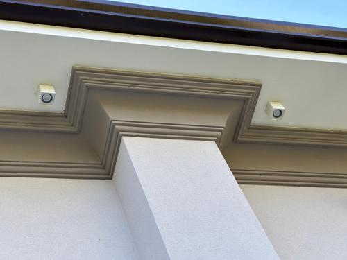 a coffered ceiling with recessed ceilings in a building at Villa Sofia in Baveno