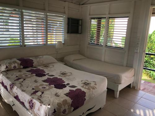 Cama o camas de una habitación en Hotel Casa Robinson