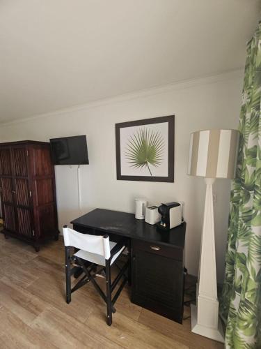 Kuchyň nebo kuchyňský kout v ubytování TROPIC Appartements PREMIUM village vacances vue mer Guadeloupe St Anne