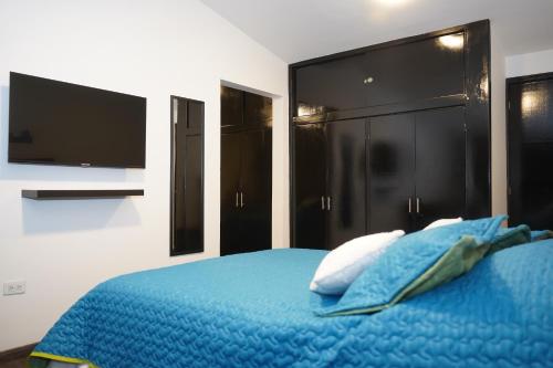 Katil atau katil-katil dalam bilik di Apartamento Azucena - Casa Tartaruga Bogotá