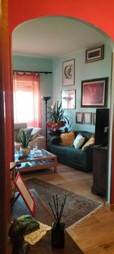 a living room with a couch and a table at La Casita b&b in Bagnoregio