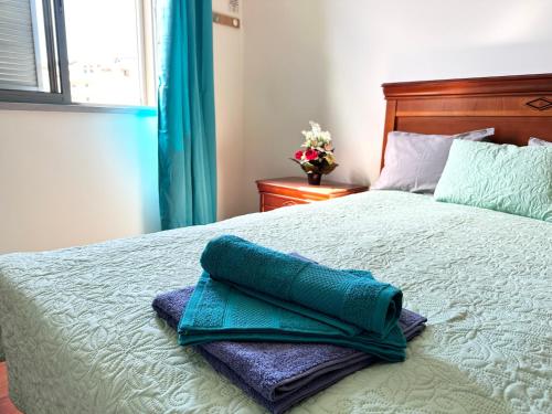 Ένα ή περισσότερα κρεβάτια σε δωμάτιο στο Rooms for Rent Residence Funchal