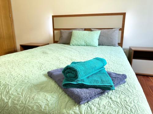 Ένα ή περισσότερα κρεβάτια σε δωμάτιο στο Rooms for Rent Residence Funchal
