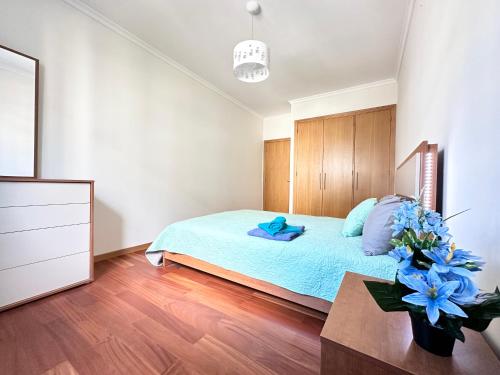 Ένα ή περισσότερα κρεβάτια σε δωμάτιο στο Rooms for Rent Residence Funchal