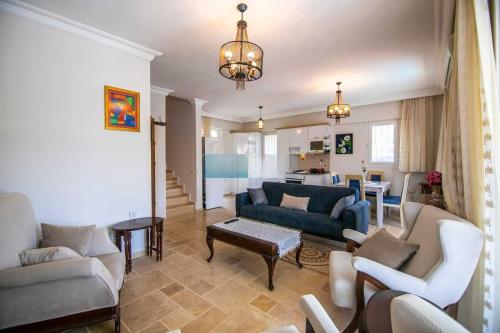 Χώρος καθιστικού στο Villa Palm Tree