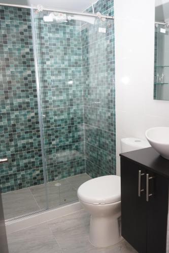Ένα μπάνιο στο Apartamento Heliconia - Casa Tartaruga Bogotá
