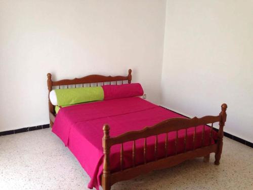 Ένα ή περισσότερα κρεβάτια σε δωμάτιο στο Appartement Ruines Romaines tipasa