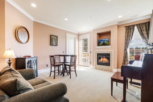 a living room with a couch and a fireplace at La Bastide Bed and Breakfast in Dundee