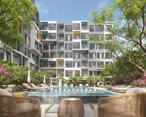 an architectural rendering of a building with a swimming pool at Laguna Lakeside Residences by Banyan Living in Laguna Phuket