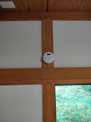 a view of two windows in a wooden ceiling at 4BRHouse near Nikko Suginami Cedar Avenue in Nikko
