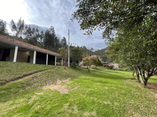 an empty yard in front of a building at Finca La Esperanza in Nobsa