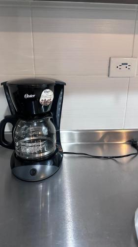 Kuchyň nebo kuchyňský kout v ubytování APTO AMOBLADO 77 mt2