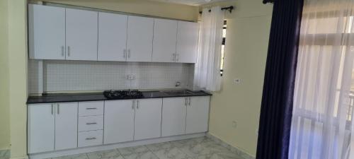 Kuchyň nebo kuchyňský kout v ubytování Legoland Residence