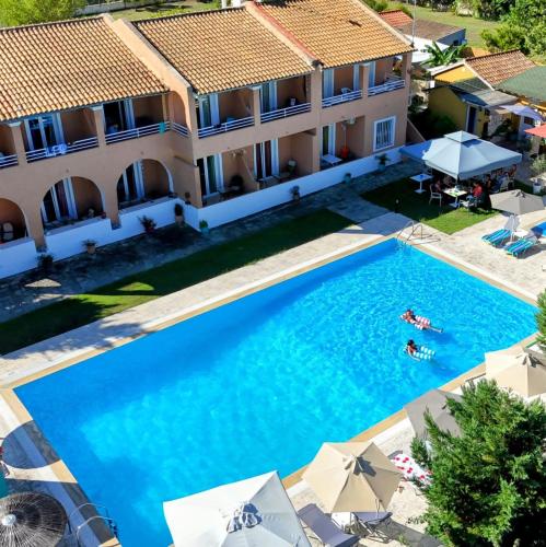 an overhead view of a swimming pool at a villa at Sausan Hotel in Sidari