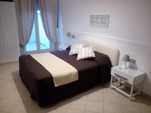Cama o camas de una habitación en Mini Hotel - Angolo Di Paradiso -