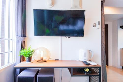 CLASSE QUATREにあるテレビまたはエンターテインメントセンター