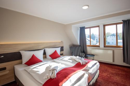 Postel nebo postele na pokoji v ubytování Hotel Lengenfelder Hof