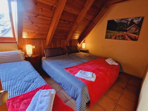 Posteľ alebo postele v izbe v ubytovaní MIRADORES de Apartamentos Rufaste