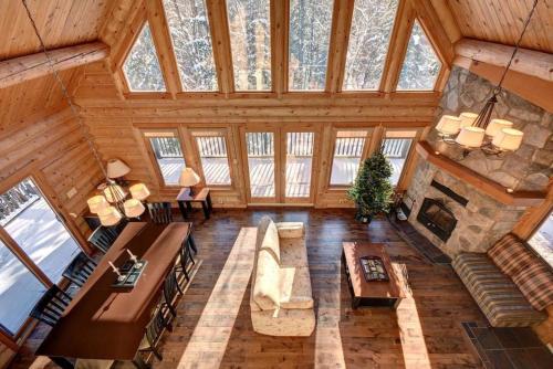 an overhead view of a living room in a log cabin at Luxury Lake Loghouse - Mont Tremblant in Labelle