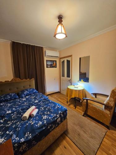 Postel nebo postele na pokoji v ubytování Buddha apartment