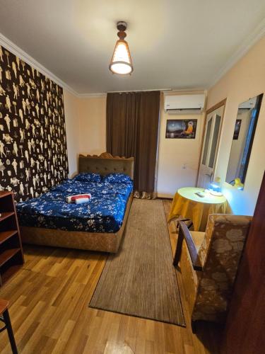 Postel nebo postele na pokoji v ubytování Buddha apartment