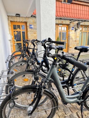 a group of bikes parked next to a building at MEINpartments - Modern Business Apartment in Wolfsburg