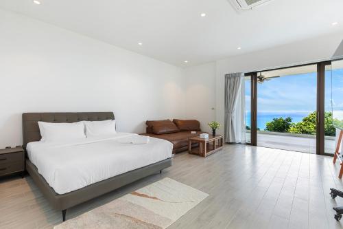 Ένα ή περισσότερα κρεβάτια σε δωμάτιο στο Villa The Wave 2 Residence