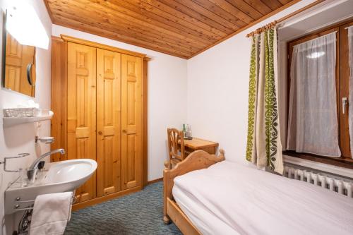 Koupelna v ubytování Hotel Cristallina