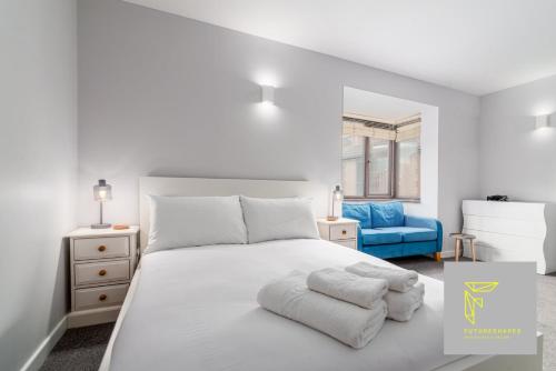 Postel nebo postele na pokoji v ubytování GuestReady - Cosy Wimbledon Studio Flat