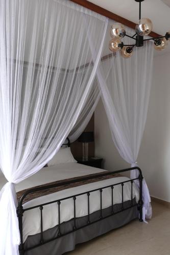Katil atau katil-katil dalam bilik di The Hideaway Boutique Hotel