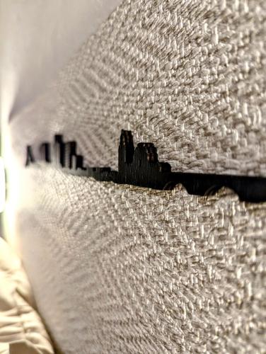 a picture of a city on the side of a pillow at Casa San Pedro 3 in Murcia