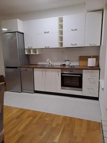 Köök või kööginurk majutusasutuses Friendly apartment