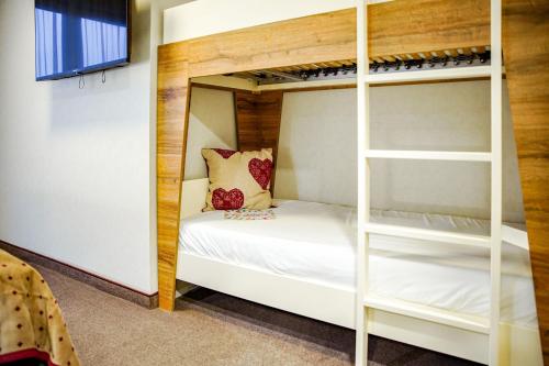 Ένα ή περισσότερα κρεβάτια σε δωμάτιο στο LODGE HOTEL Winterberg