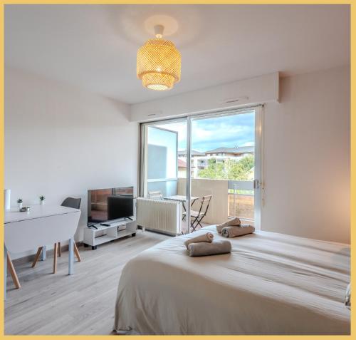 Postel nebo postele na pokoji v ubytování Le Cosy Nest I Studio I Etrembières