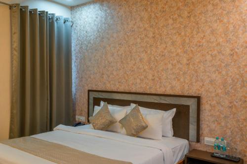 Katil atau katil-katil dalam bilik di Hotel Kiaara