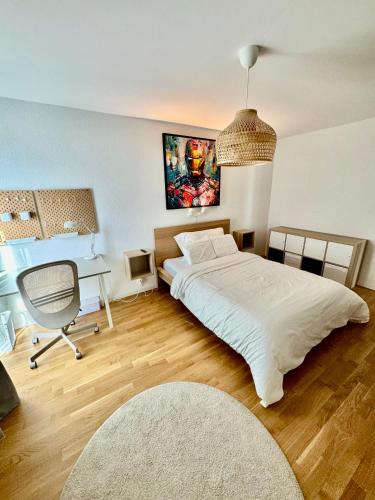 Ένα ή περισσότερα κρεβάτια σε δωμάτιο στο Great apartment in Lausanne