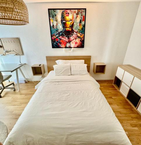 Ένα ή περισσότερα κρεβάτια σε δωμάτιο στο Great apartment in Lausanne