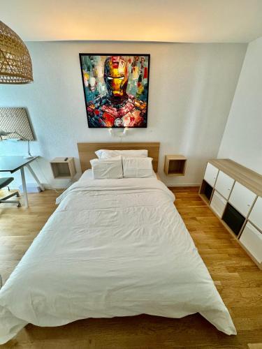 Ένα ή περισσότερα κρεβάτια σε δωμάτιο στο Great apartment in Lausanne