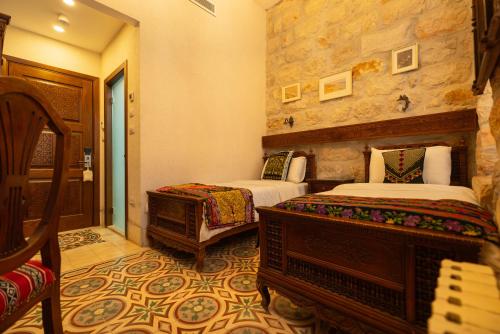 Katil atau katil-katil dalam bilik di Jerusalem Hotel