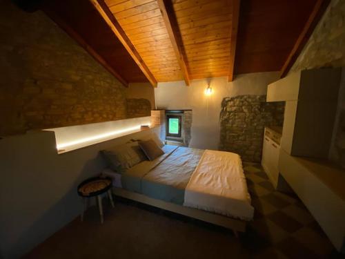 Ένα ή περισσότερα κρεβάτια σε δωμάτιο στο Serenity B&B immerso tra i monti d'Appennino