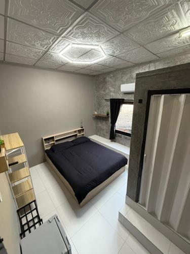 Ένα ή περισσότερα κρεβάτια σε δωμάτιο στο Green Dreams Guesthouse