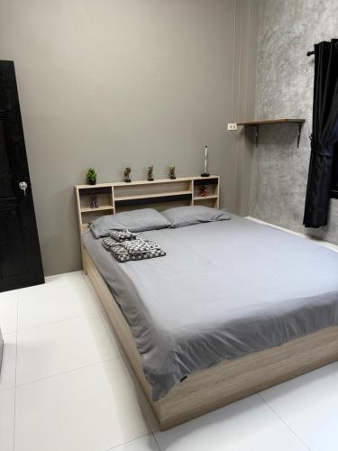 Ένα ή περισσότερα κρεβάτια σε δωμάτιο στο Green Dreams Guesthouse