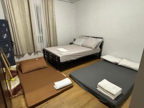 Ένα ή περισσότερα κρεβάτια σε δωμάτιο στο 1Bedroom Unit in Mesatierra Garden