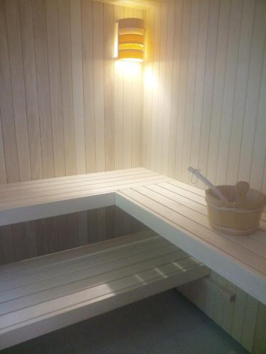 a bench in a sauna with a light on it at Neu renovierte Mühle, Einzellage im Waldviertel in Scheideldorf