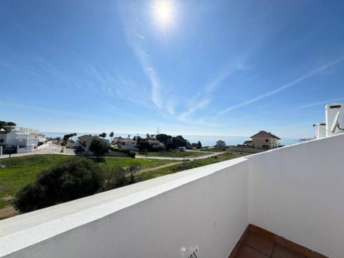 a view of the ocean from the balcony of a house at Estupendo Adosado La Cala de Mijas in La Cala de Mijas
