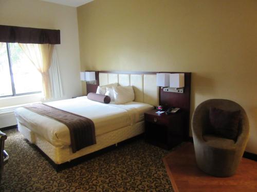 Ένα ή περισσότερα κρεβάτια σε δωμάτιο στο Baymont by Wyndham Columbia Fort Jackson