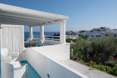 a balcony with a view of the ocean at Eunymos Panarea in Panarea