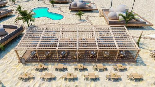 an aerial view of a resort on the beach at Eden Bubbles Camp in Ras Sedr