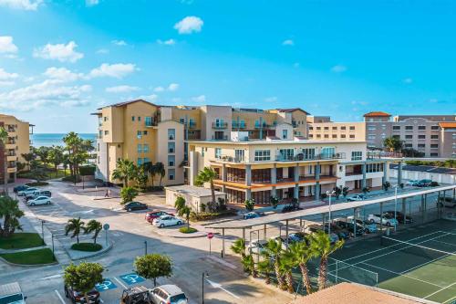 an aerial view of a city with a tennis court at Beachfront - Royal Penthouse 3BR condo - BC352 in Palm-Eagle Beach